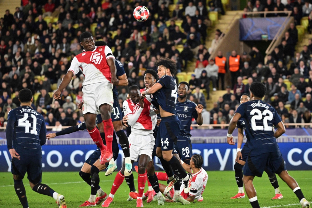 Monaco’s Swiss Breel Embolo heads the ball. — Pic by AFP
