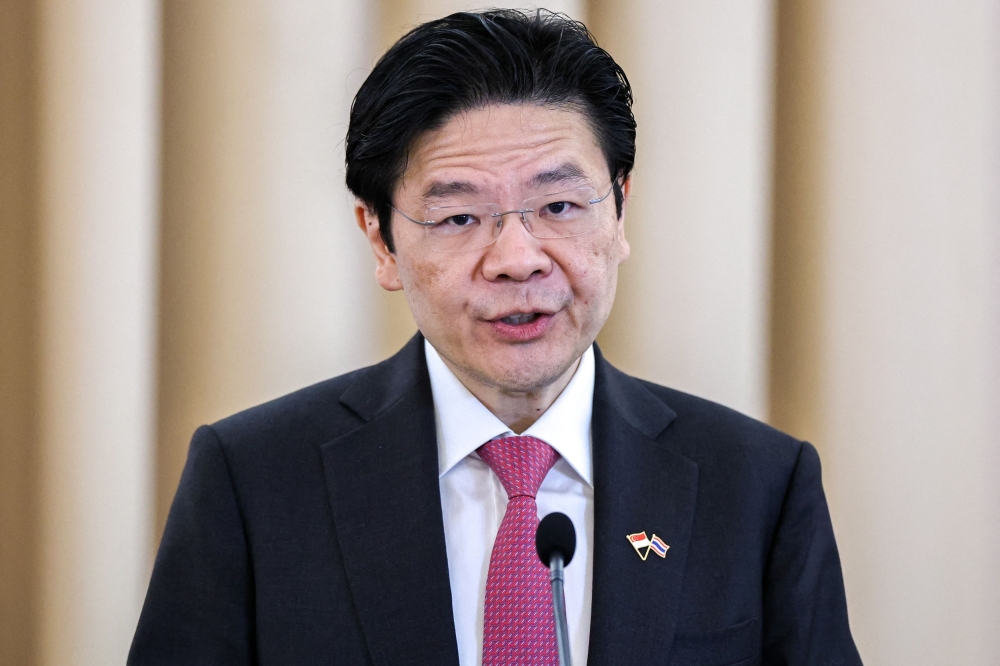 Singapore must hold its general election by November 2025, but Prime Minister Lawrence Wong has the remit to call polls earlier. — Reuters pic