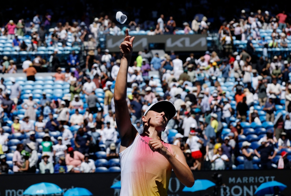 Poland’s Iga Swiatek celebrates winning her quarter final match against Emma Navarro of the US at Melbourne Park, January 22, 2025. — Reuters pic 