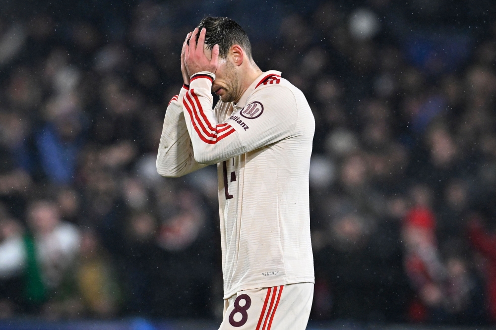 A visibly upset Leon Goretzka from Bayern Munich after his team Feyenoord's second goal. — Pic by AFP