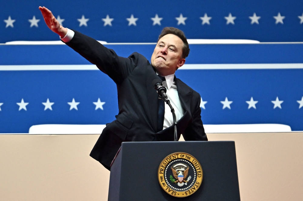 Elon Musk’s gesture that many have interpreted as a Nazi salute. — Pic by AFP