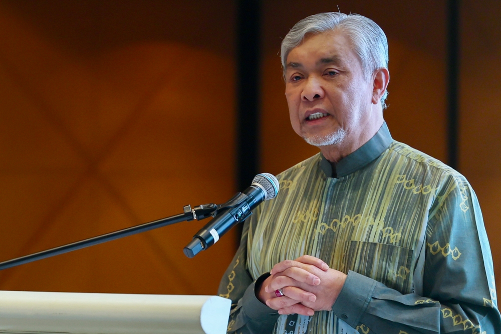 Zahid was responding to questions about whether Umno had discussed or planned to discuss the AGC’s application for the gag order. — Bernama pic