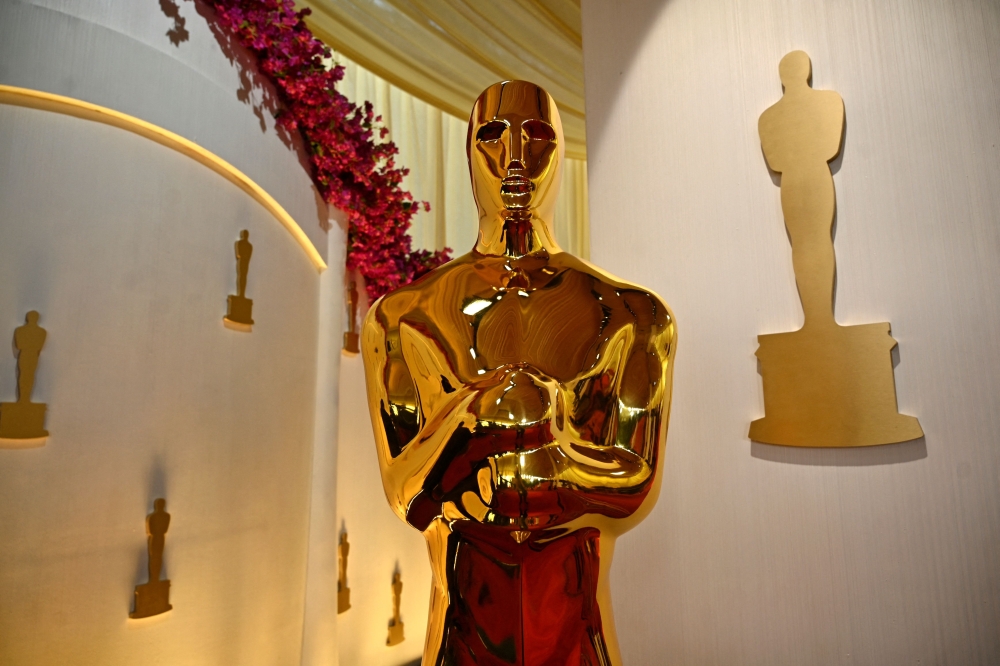 File picture of an Oscar statue pictured at the red carpet of the 96th Annual Academy Awards at the Dolby Theatre in Hollywood, California on March 9, 2024. This year’s Oscar nominations will be unveiled on January 23, 2025 in an announcement postponed by the devastating Los Angeles wildfires, with transgender cartel musical ‘Emilia Perez’ expected to lead a highly competitive field. — AFP pic 
