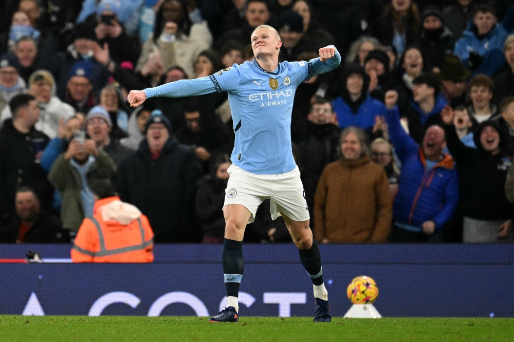 Manchester City’s Erling Haaland celebrates scoring the team's second goal against Chelsea. — Pic by AFP