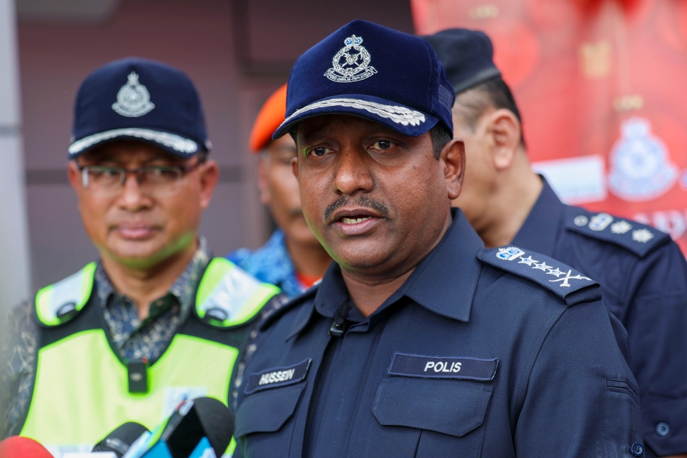 Selangor Police Chief Datuk Hussein Omar Khan (right) speaking to the media after attending the Road Safety Campaign in conjunction with Op Selamat Chinese New Year 2025 at the Selangor Contingent Level at the PJS 2 Toll Plaza. — Bernama pic