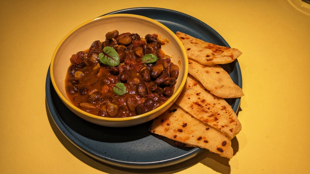 Bean Stew is hearty and comforting, with shreds of smoked duck and flatbread.— Picture by Ethan Lau