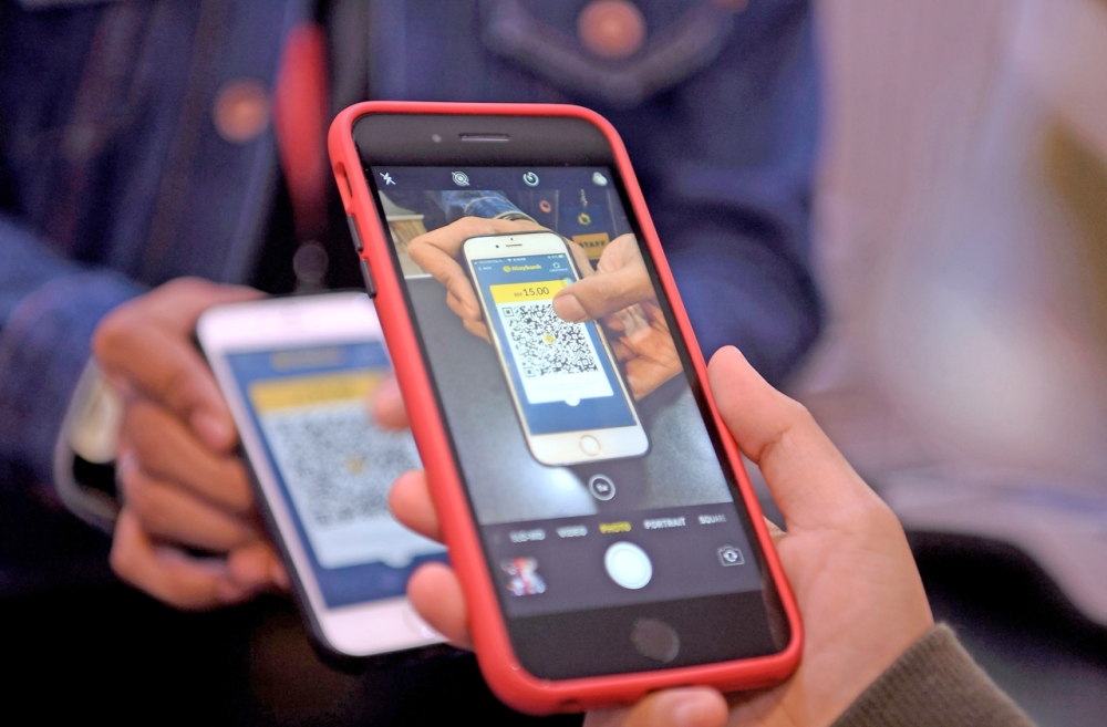 Effective tomorrow, members of the public here can utilise a wide variety of cashless payment methods for all services provided by the Miri City Council. — Bernama pic