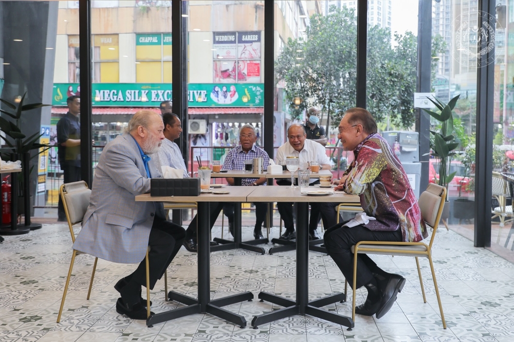His Majesty Sultan Ibrahim (left) and Datuk Seri Anwar Ibrahim during their breakfast this morning. — Picture from Facebook/Sultan Ibrahim