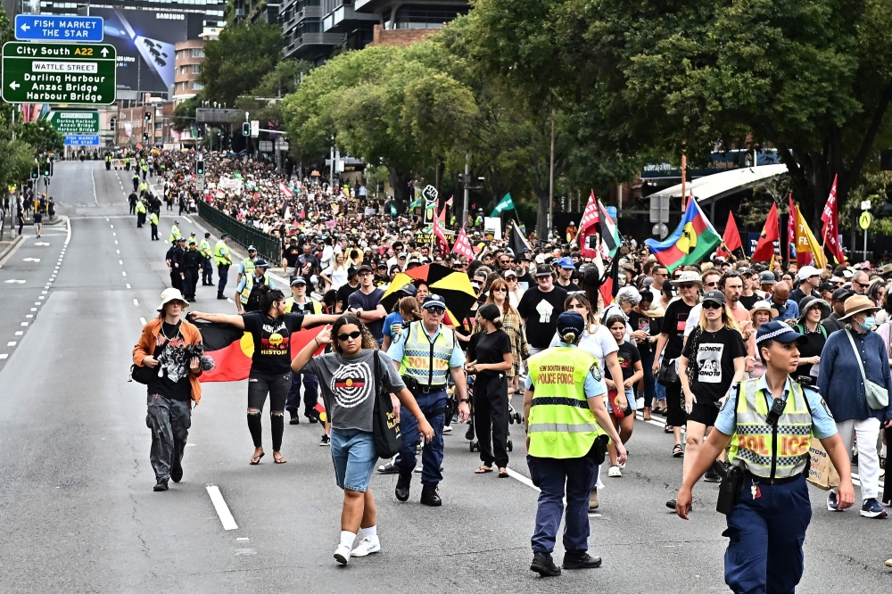 Tens of thousands of Australians protested over the treatment of indigenous people as the country celebrated a national holiday marking the 1788 arrival of British colonisers on January 26. — AFP pic