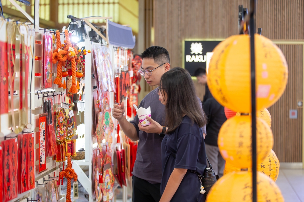 Shoppers browse for decorations ahead of the Chinese New Year celebration in Kuala Lumpur, January 26, 2024. — Picture by Raymond Manuel