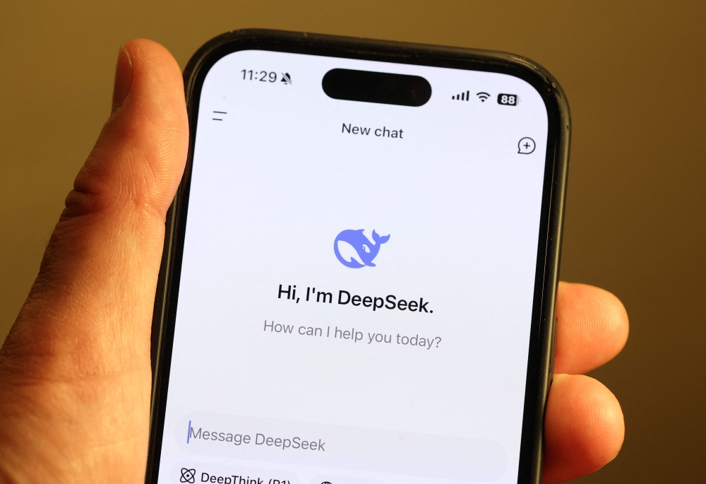 Newly launched Chinese AI app DeepSeek has surged to number one in Apple's App Store and has triggered a sell-off of US tech stocks over concerns that Chinese companies' AI advances could threaten the bottom line of tech giants in the United States and Europe. — Pic by AFP