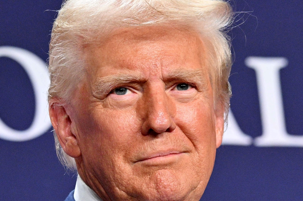 US President Donald Trump said yesterday the low-cost Chinese AI model DeepSeek was a “wake up call” for US firms, after its emergence caused a rout in tech shares. — Pic by AFP 