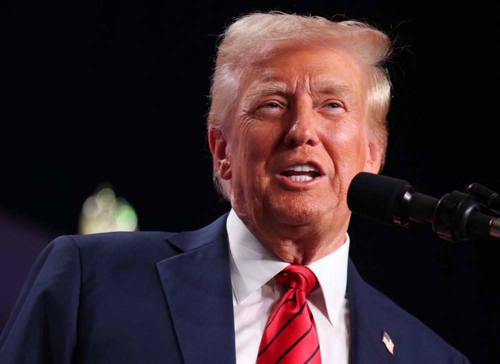 Donald Trump addresses the 2025 Republican Issues Conference at the Trump National Doral Miami. — Pic by AFP