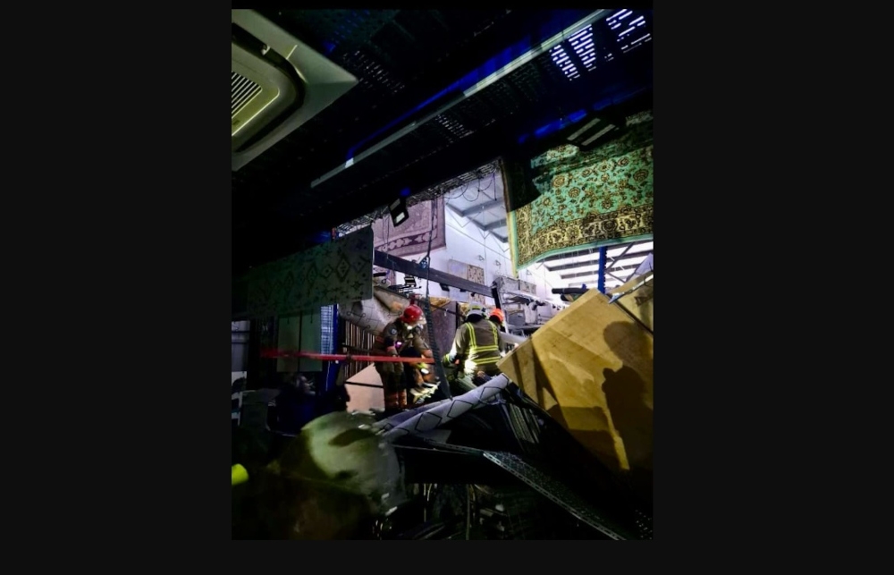 Firefighters and rescuers, aided by two SCDF search dogs, worked to locate the trapped individuals in the affected area, which measured about 20m by 10m. — Picture from Facebook/Singapore Civil Defence Force