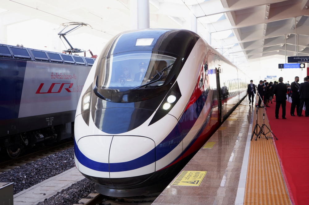 A train is ready on the station during the handover ceremony of the high-speed rail project linking the Chinese south-western city of Kunming with Vientiane, in Vientiane, Laos, in this file picture dated December 3, 2021. — Reuters pic 
