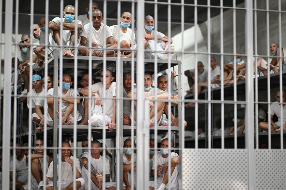 Inmates look on as they remain in a cell at the Counter-Terrorism Confinement Centre (CECOT) mega-prison, where hundreds of members of the MS-13 and 18 Street gangs are being held, in Tecoluca, El Salvador on January 27, 2025. — AFP pic 