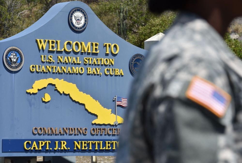 This photo reviewed by the US military and made during an escorted visit shows a welcome board at the road to the US Naval Station in Guantanamo Bay, Cuba, April 7, 2014. — AFP pic