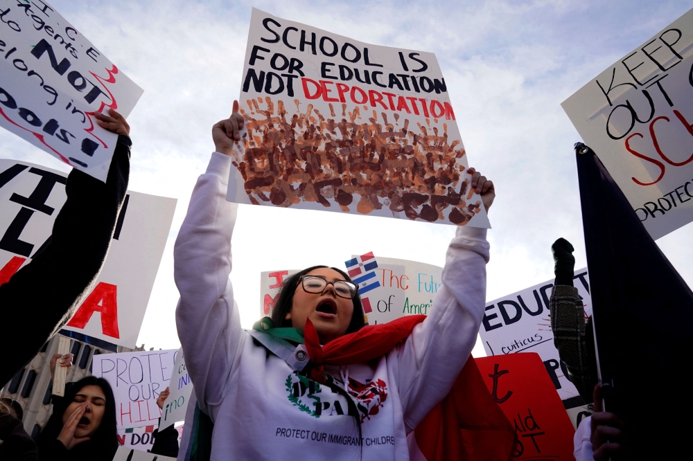 Protesters opposing possible Immigration and Customs Enforcement (ICE) raids in public schools chant outside the State Department of Education during their monthly board meeting in Oklahoma City, Oklahoma, U.S. January 28, 2025. — Reuters pic