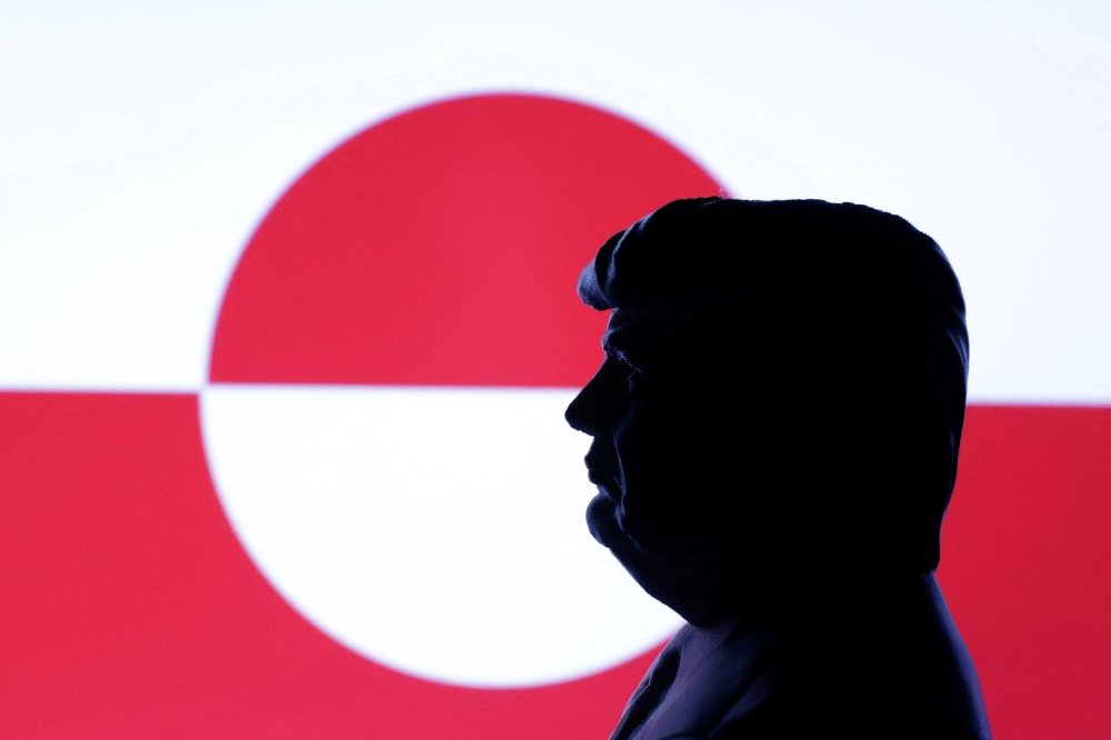 A 3D-printed miniature model of U.S. President Donald Trump and the Greenlandic flag are seen in this illustration taken January 27, 2025. — Reuters pic