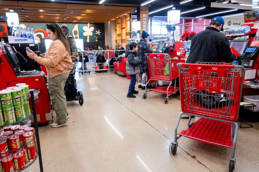 Customers go through the self check out line at a Target store on the week of Black Friday shopping in Chicago, Illinois, U.S. November 26, 2024. — Reuters pic