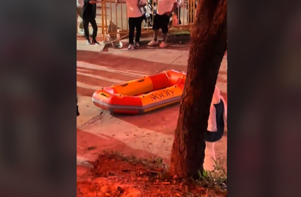 According to Shah Alam police, the victim was visiting the theme park with her family when the inflatable raft suddenly fell off its hook and hit the side of her body. — Screengrab from TikTok/mierull_fpv2