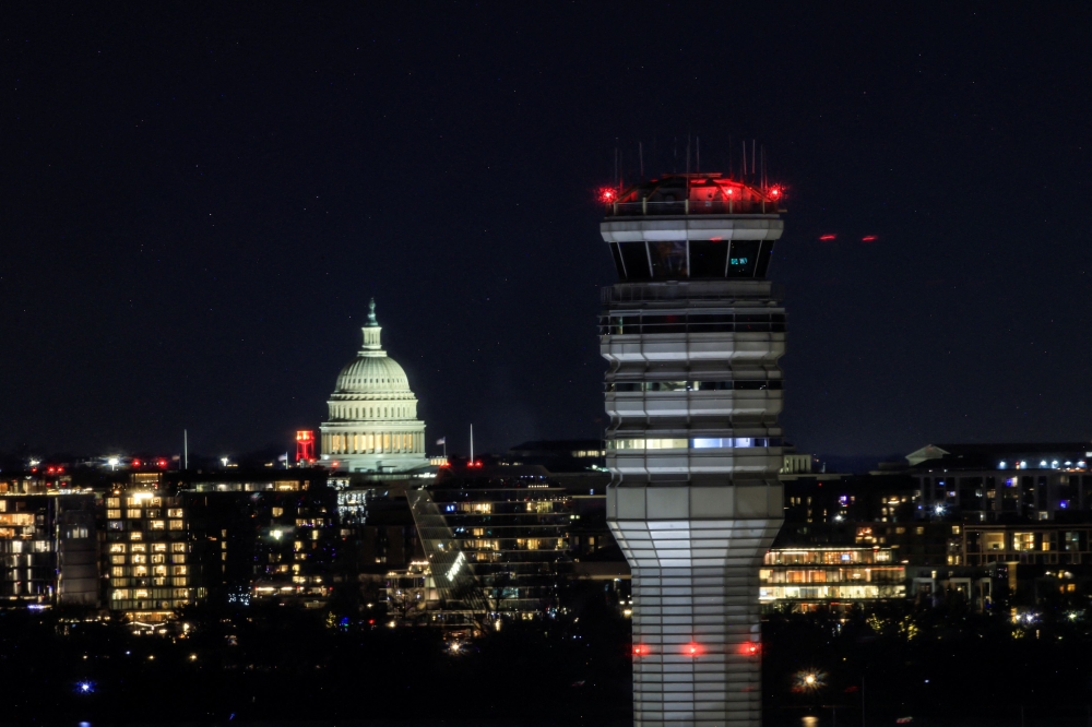 The air traffic control at Ronald Reagan Washington National Airport is pictured, in the aftermath of the collision of American Eagle flight 5342 and a Black Hawk helicopter that crashed into the Potomac River, with the Capitol dome in the background, as seen from Virginia, U.S., January 30, 2025.  — Reuters pic