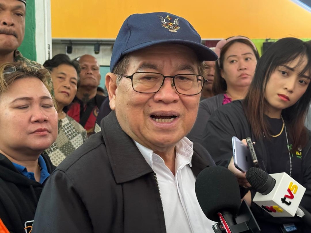 Uggah speaks to reporters during the press conference. — The Borneo Post pic