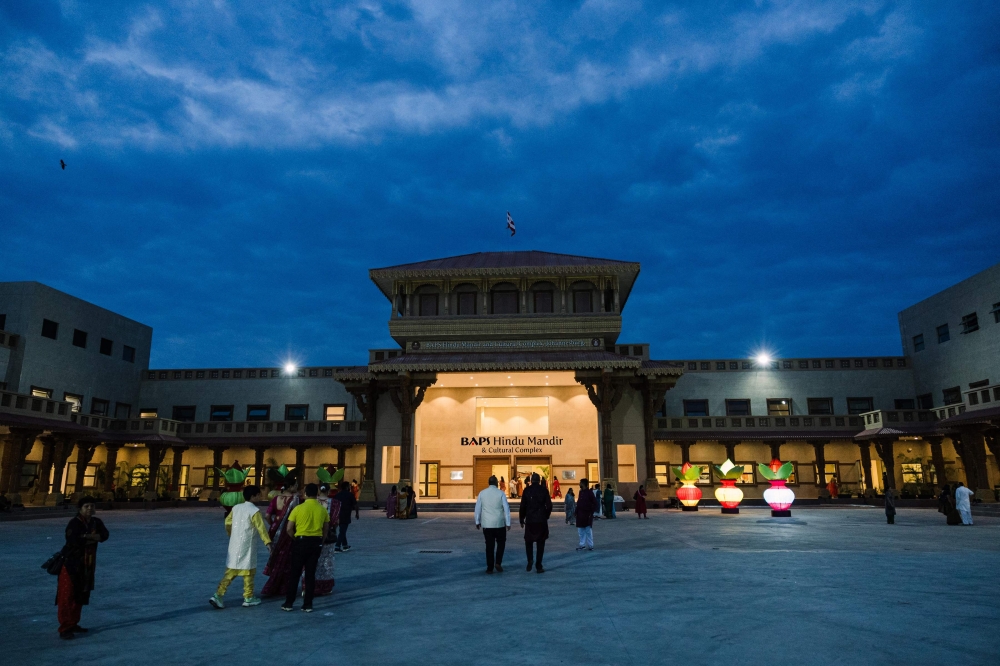 Devotees arrive before sunrise for the consecration ceremony and opening of the first phase of the BAPS (Bochasanwasi Akshar Purushottam Swaminarayan Sanstha) Hindu Mandir, the largest Hindu temple and cultural complex in the Southern Hemisphere, in Johannesburg February 2, 2025. — AFP pic