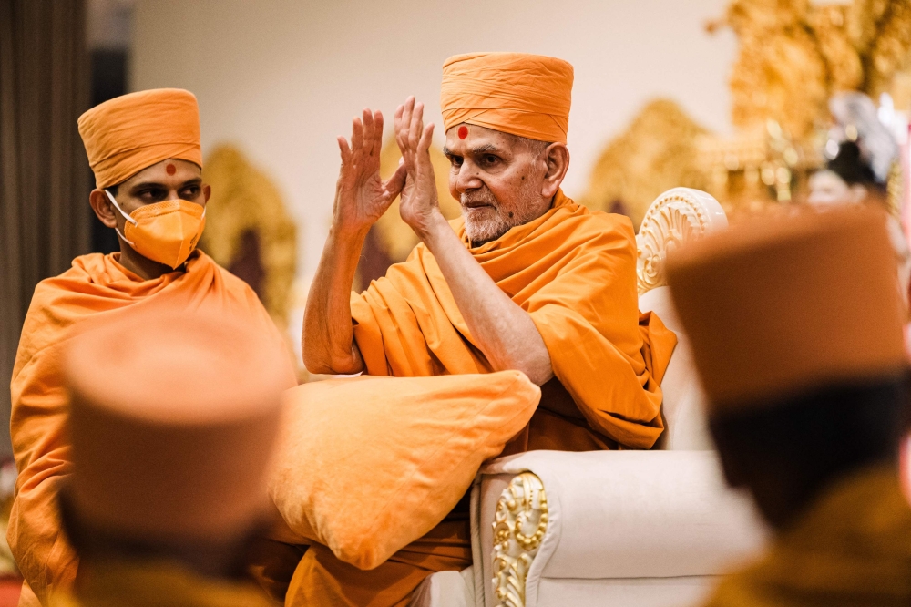 Spiritual leader Mahant Swami Maharaj blesses the congregation of devotees during the consecration ceremony and opening of the first phase of the BAPS (Bochasanwasi Akshar Purushottam Swaminarayan Sanstha) Hindu Mandir in Johannesburg February 2, 2025. — AFP pic