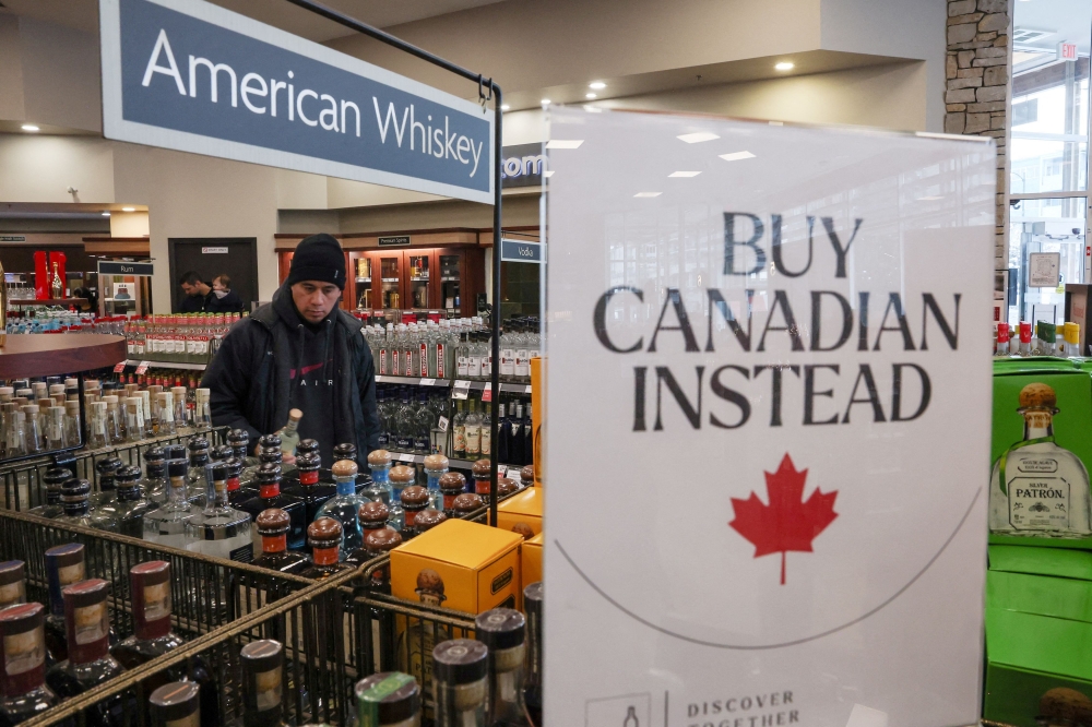 A sign that reads “Buy Canadian Instead” is displayed at a store in Vancouver, British Columbia, Canada, February 2, 2025. — Reuters pic