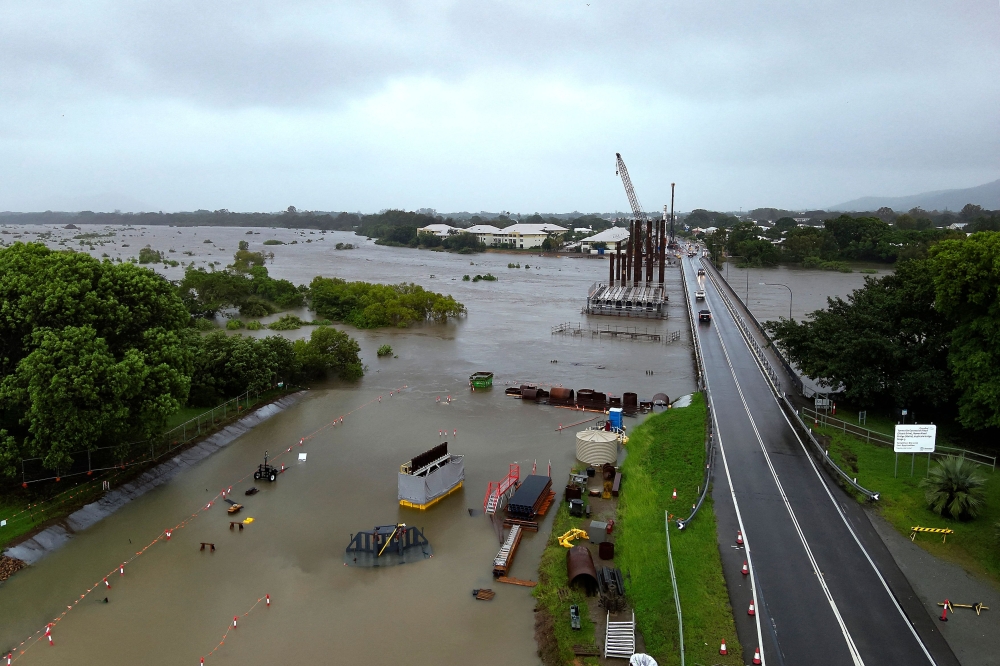 A handout photo taken on February 2, 2025 and released by the Queensland Fire Department on February 3, 2025 shows an aerial view of flood-affected areas around Townsville, Queensland. — AFP pic