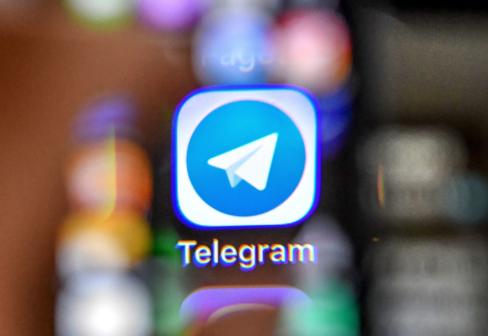 An accountant lost a total of RM65,520 after she fell victim to a syndicate’s investment scam via the Telegram application. — AFP
