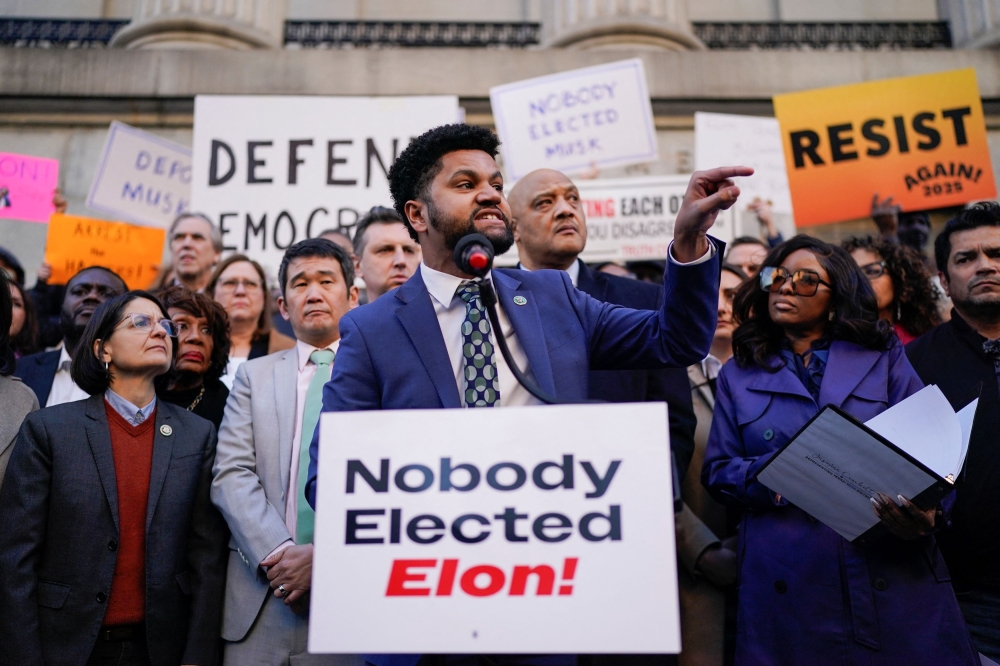 U.S. Rep. Maxwell Frost gestures as demonstrators rally outside the U.S. Treasury Department after it was reported billionaire Elon Musk has gained access to Treasury's federal payments system, in Washington, U.S., February 4, 2025. — Reuters pic
