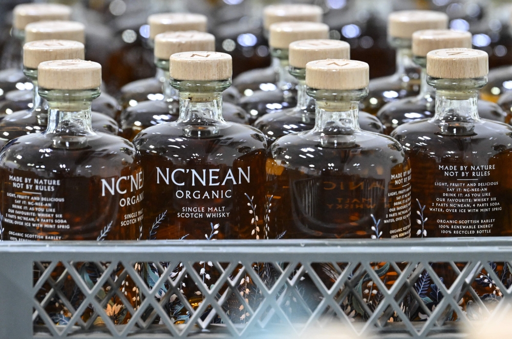Bottles of Nc'nean Organic Single Malt Whisky, are pictured at their distillery in Drimnin, in the western highlands of Scotland on February 3, 2025. — AFP pic