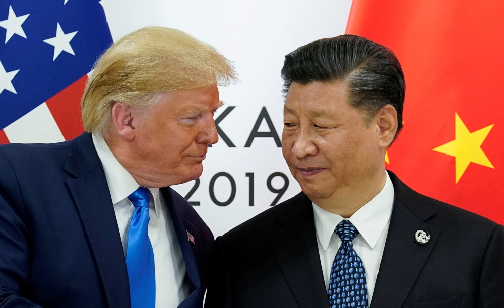 File picture of US President Donald Trump meeting with China's President Xi Jinping at the start of their bilateral meeting at the G20 leaders summit in Osaka, Japan, June 29, 2019. — Reuters pic