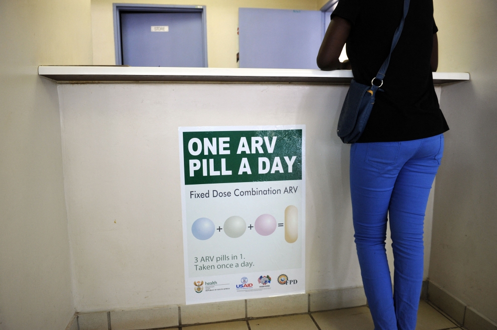 A woman queues at Phedisong clinic on April 8, 2013 during the launch of the new single dose anti-AIDs drug in Ga-Rankuwa, 100 kms north of Johannesburg. — AFP pic