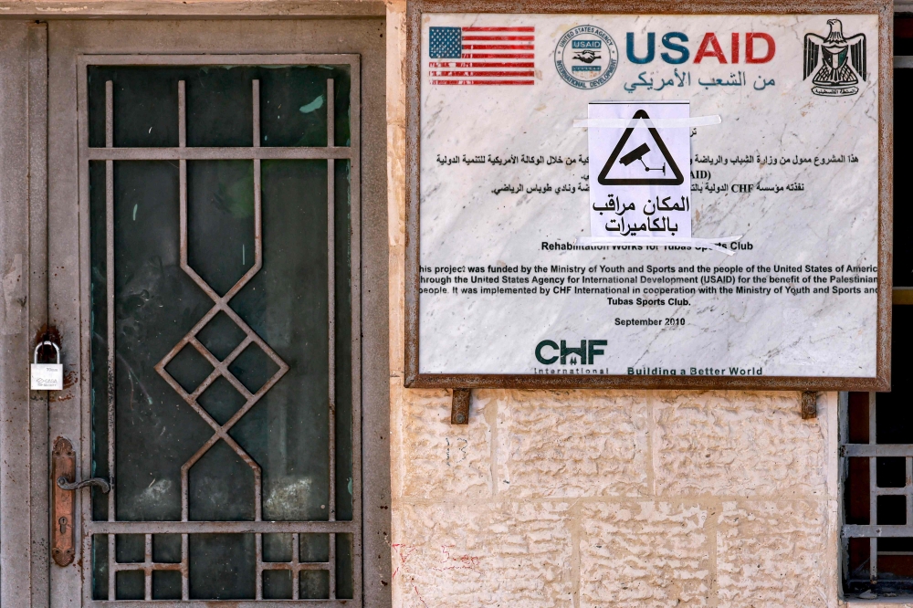 This view shows the closed door of the USAID-funded project to rehabilitate the Tubas Sports Club in Tubas in the north of the occupied West Bank. — AFP pic