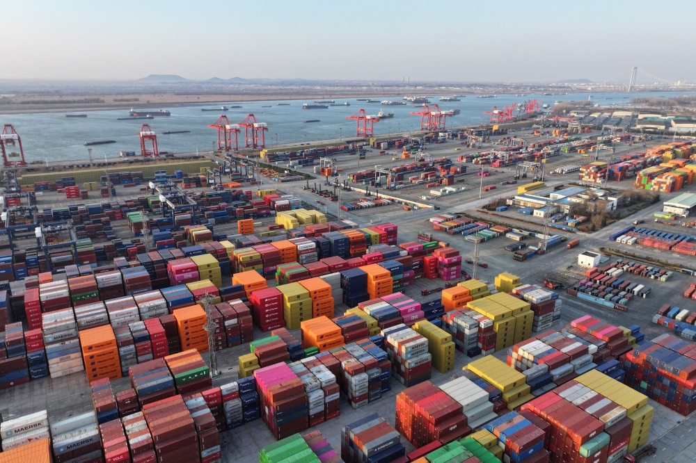 An aerial view shows containers at the port in Nanjing, in China's eastern Jiangsu province on February 4, 2025. — AFP pic