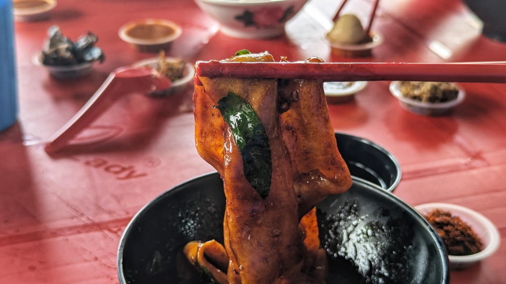 The thick, hand-pulled noodles should be your go-to option at Kung Fu Smooth Pan Mee. — Picture by Ethan Lau