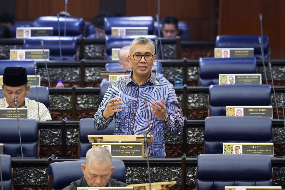 Investment, Trade and Industry Minister Datuk Seri Tengku Zafrul Abdul Aziz speaks in the Dewan Rakyat on February 6, 2025. — Bernama pic
