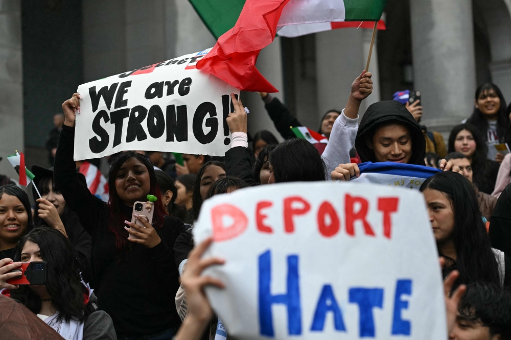 Students gather outside of LA City Hall to protest against US President Donald Trump and for immigration rights in Los Angeles, California on February 5, 2025. — AFP pic 