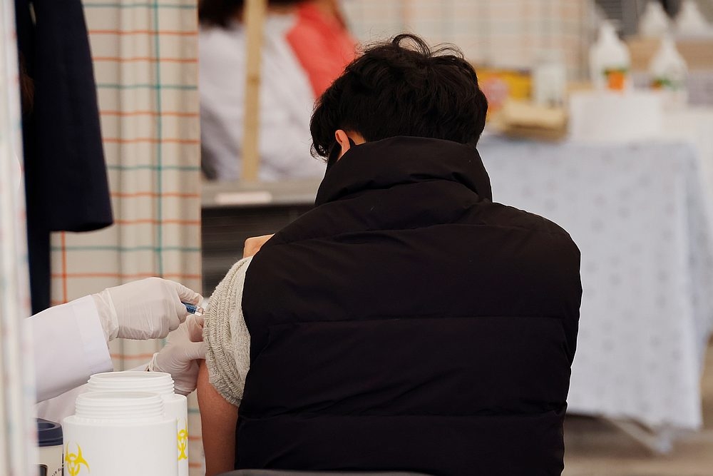 A man gets an influenza vaccine at a hospital in Seoul October 21, 2020. Flu jab inquiries and bookings have increased at clinics in Hong Kong following the death of Taiwanese actress Barbie Hsu Shi-yuan from pneumonia caused by influenza. — Reuters pic