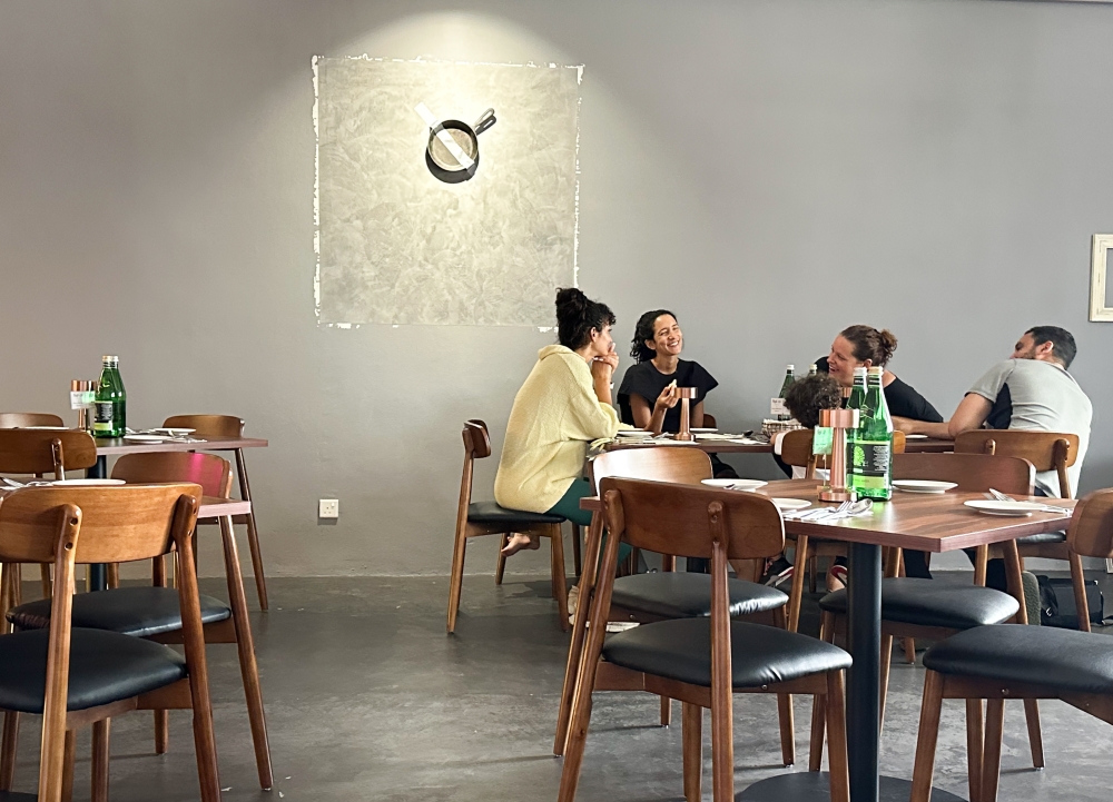 Enjoy happy meals at La Stellar Maison where a playful interpretation of that famous banana duct tape artwork is reimagined with a cast iron pan — Picture by Lee Khang Yi