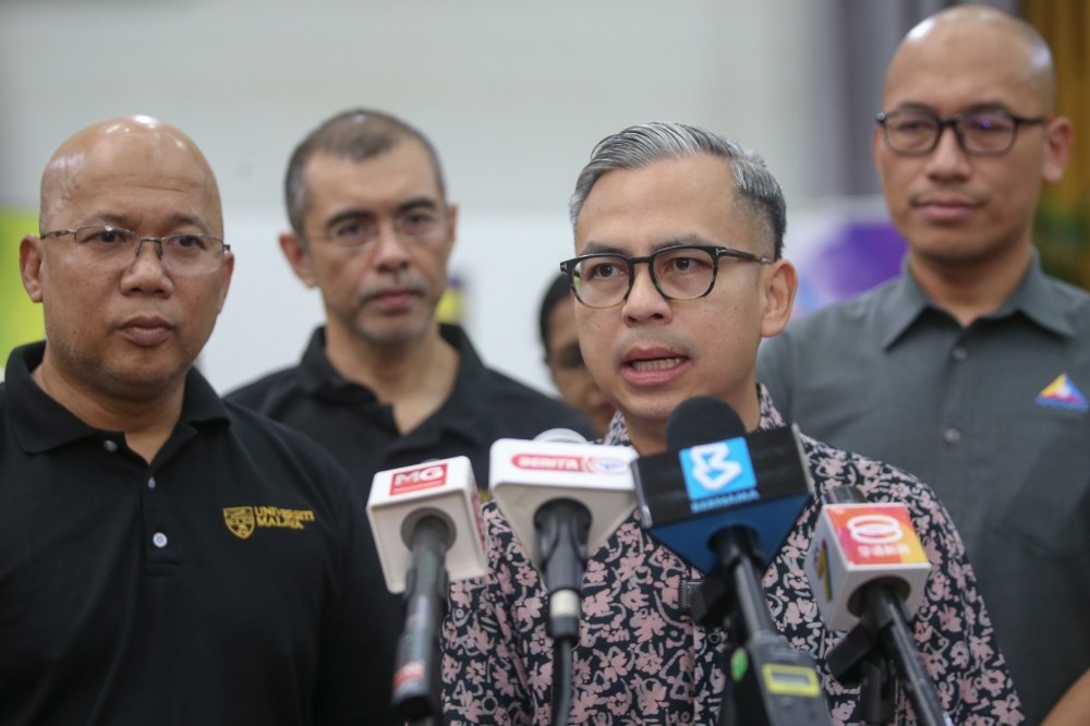 Communications Minister Fahmi Fadzil speaks to reporters during his visit to review WiFi access points at Kolej Kediaman Ketujuh Za'ba at University Malaya in Kuala Lumpur .February 8, 2025. — Picture by Yusof Mat Isa