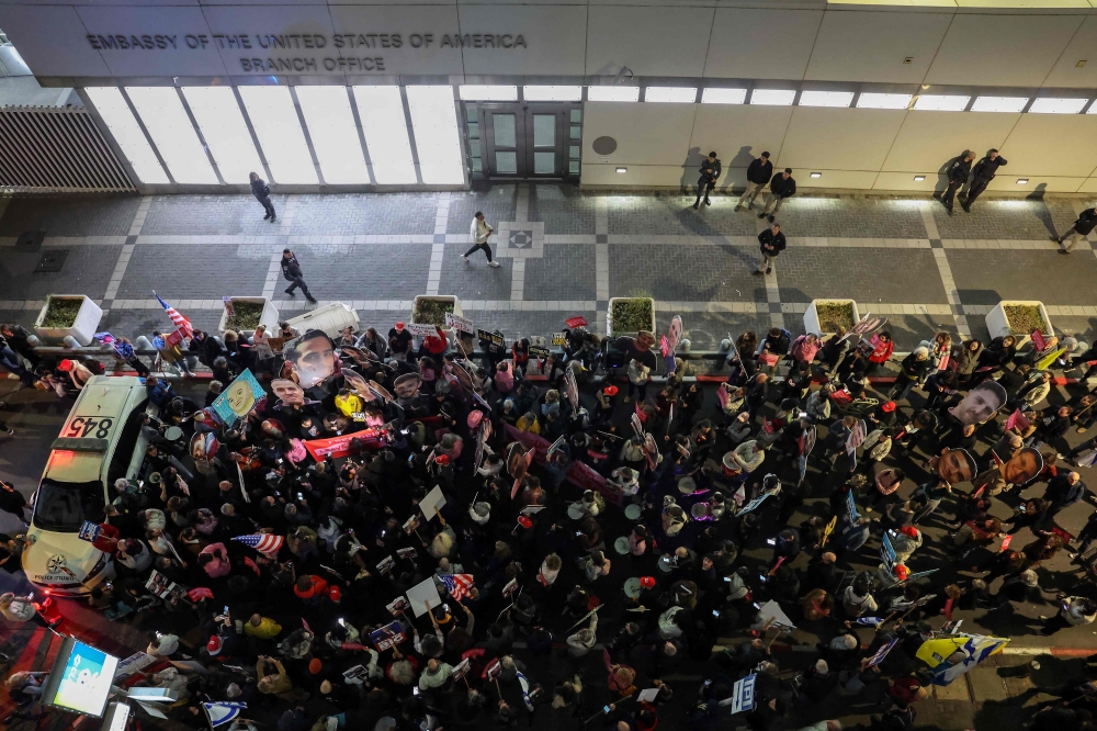 Hamas is set to release three Israeli hostages today in exchange for 183 prisoners held by Israel in the fifth exchange of a fragile Gaza ceasefire. — Pic by AFP