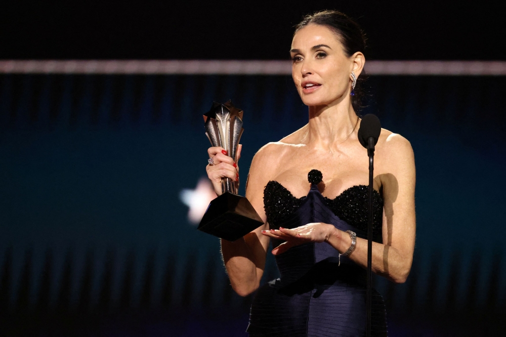 Demi Moore accepts the Best Actress award for ‘The Substance’ during the 30th Annual Critics Choice Awards, in Santa Monica, California February 7, 2025. — AFP pic