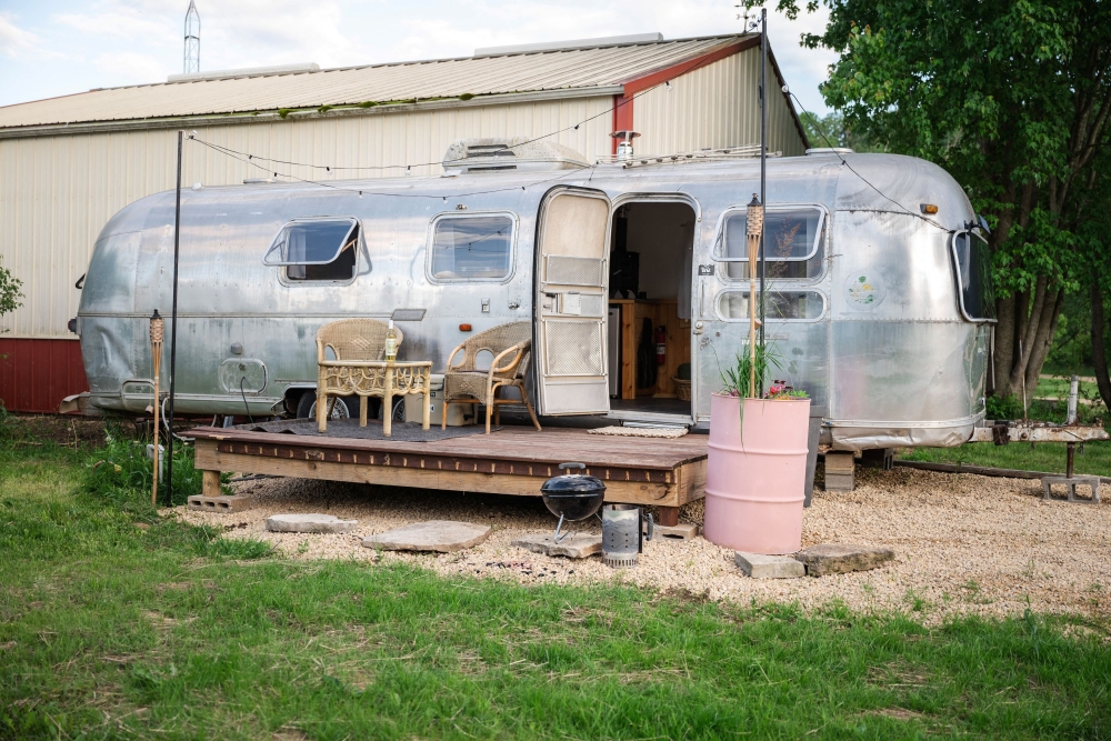 Farmer Brit Thompson's vintage Airstream camper, being used as an Airbnb rental to capitalize on an explosion of city dwellers and suburbanites flocking to rural areas for vacations, is seen on Thompson's Pink River Ranch in Blanchardville, Wisconsin, May 2024. — Honest Mom Photography handout via Reuters