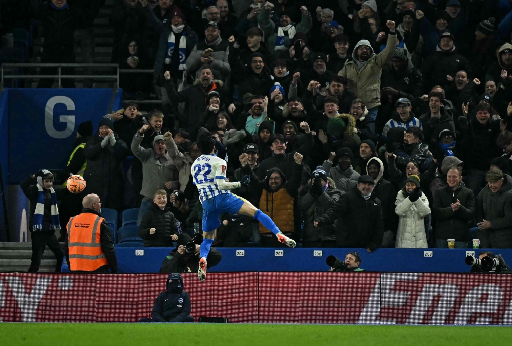 Brighton’s Kaoru Mitoma celebrates scoring the team's third goal against Chelsea — Pic by AFP