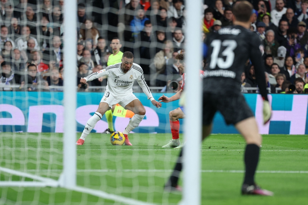 Real Madrid’s Kylian Mbappe controls the ball against Club Atletico de Madrid  — AFP