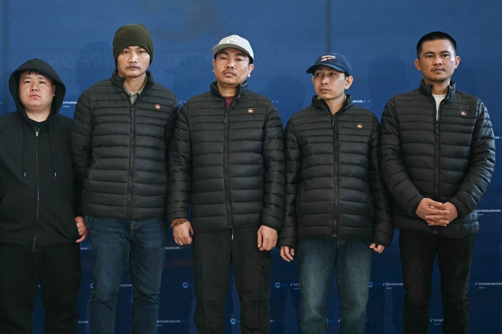 Freed Thai nationals Surasak Rumnao, Sayhian Suwannkham, Bannawat Saethao, Watchara Sriaoun and Pongsak Thaenna — Pic by AFP
